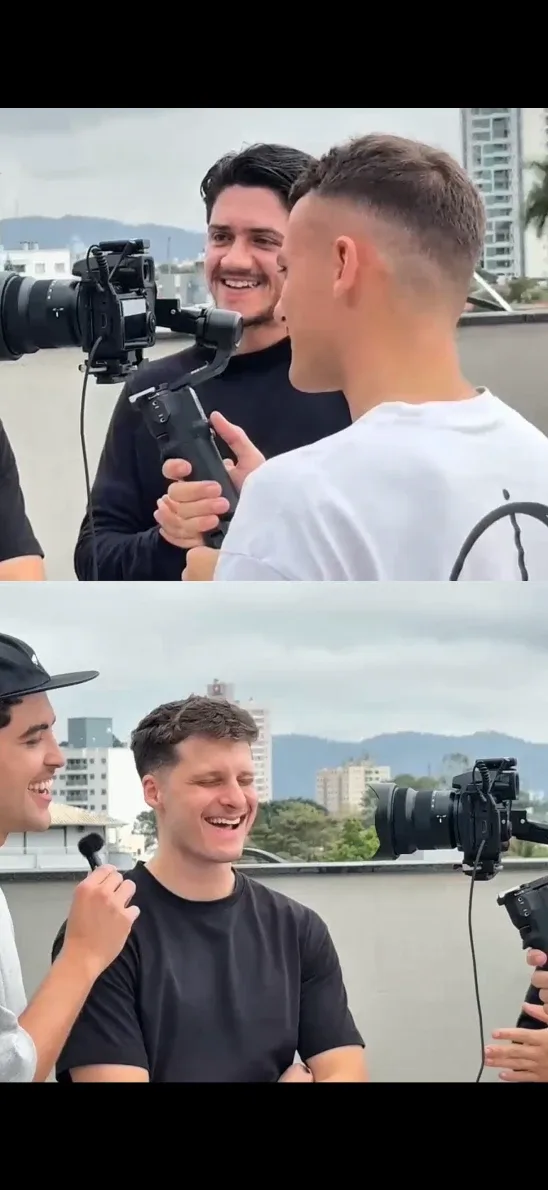 Pedro filmando com câmera na mão nos bastidores